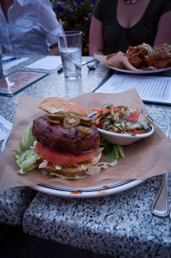 Veggie Burger - grilled, LTO, Vermont Cheddar, Carolina Q sauce, side of cucumber salad.