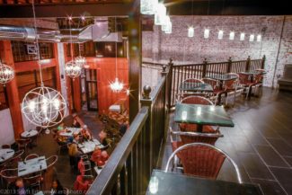 A shot of the main bar from upstair's lounge. (Photo by Erb Photography)