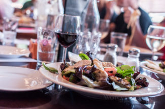 Salad Topped with Salmon from Livia's Dish on Main Street in Worcester, MA