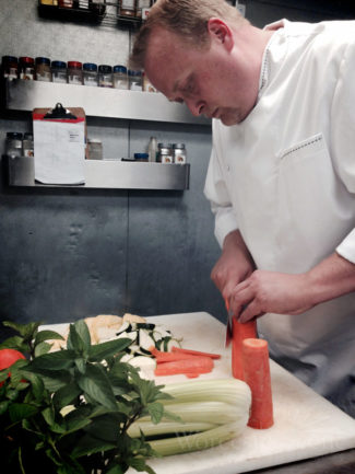 Chef Nemeroff cooking in the Ceres Bistro kitchen