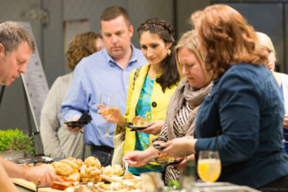 Members of Worcester Foodies are enjoying a preview of Niche Hospitality's Test Kitchen in Worcester, MA