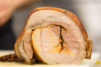 Pork ready to be made into Porchetta Con Pimenton From Niche Test Kitchen in Worcester