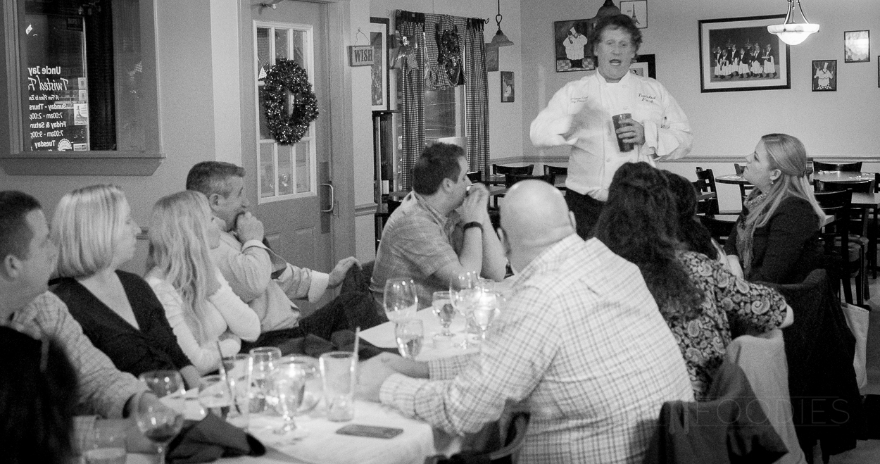 Chef Jay Powell speaking with the Foodies group in March 2016.