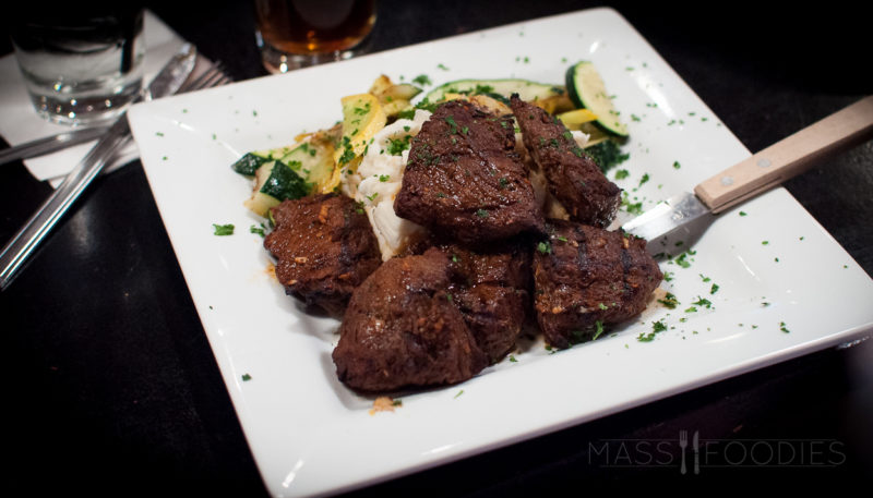 A Hearty Tavern Meal of Steak Tips and Mashed Potato
