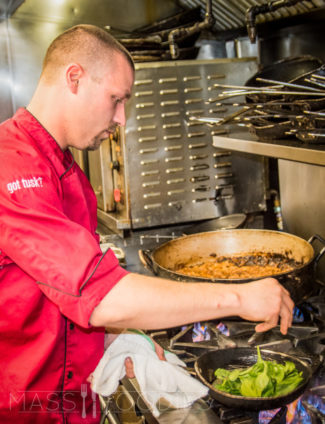 Executive chef, Christopher O'Hara in the kitchen at Flying Rhino on Shrewsbury Street in Worcester, MA (Photograph by Alex Belisle)