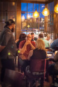 Chef Tim Russo speaking with a group of Worcester Foodies during the June outing