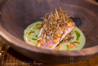 Poached Scottish Salmon served with an Herb Curry and Chanterelles (Photograph by Alex Belisle)
