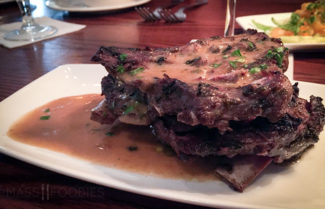 Grilled Lamb Riblets (Garlic and Mint Marinated, Served with Lamb Reduction) during One Eleven Chop House's Surf & Turf Promotion.