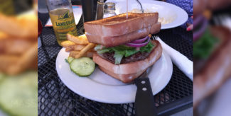 Nestled between two grilled cheese sandwiches, the Bumper-to-Bumper burger from Vintage Grille on Shrewsbury Street in Worcester, MA is hearty.