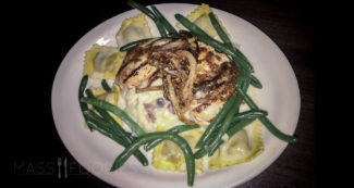 Honey Mustard Chicken with butternut squash ravioli, garlic mashed potatoes, asparagus and crispy onions from Wildwoods Steakhouse in Marlborough, MA