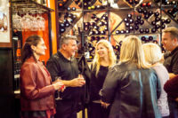 A group of attendees to Chef's Best: The Champagne Experience at Bocado in Wellesley, MA