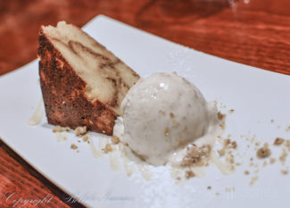 The final course from chef Tim Russo's Chef's Tasting Menu at Lock 50 in Worcester, MA. Cinnamon and spice bread pudding on a brown butter sauce with a scoop of house-made brown butter ice cream