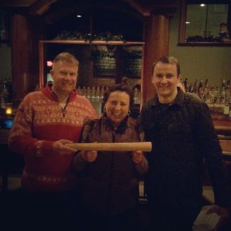 Sarah Connell, Ben, and Jenn pose with November Project leader, Sam Kanary at Armsby Abbey.