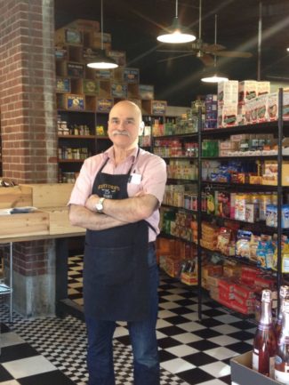 Ed Hyder standing in his marketplace in Worcester, MA (Source: Facebook)
