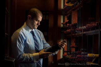 Keith Carolan in the wine cellar of VIA Italian Table on Shrewsbury Street in Worcester, MA (Erb Photo for Mass Foodies)
