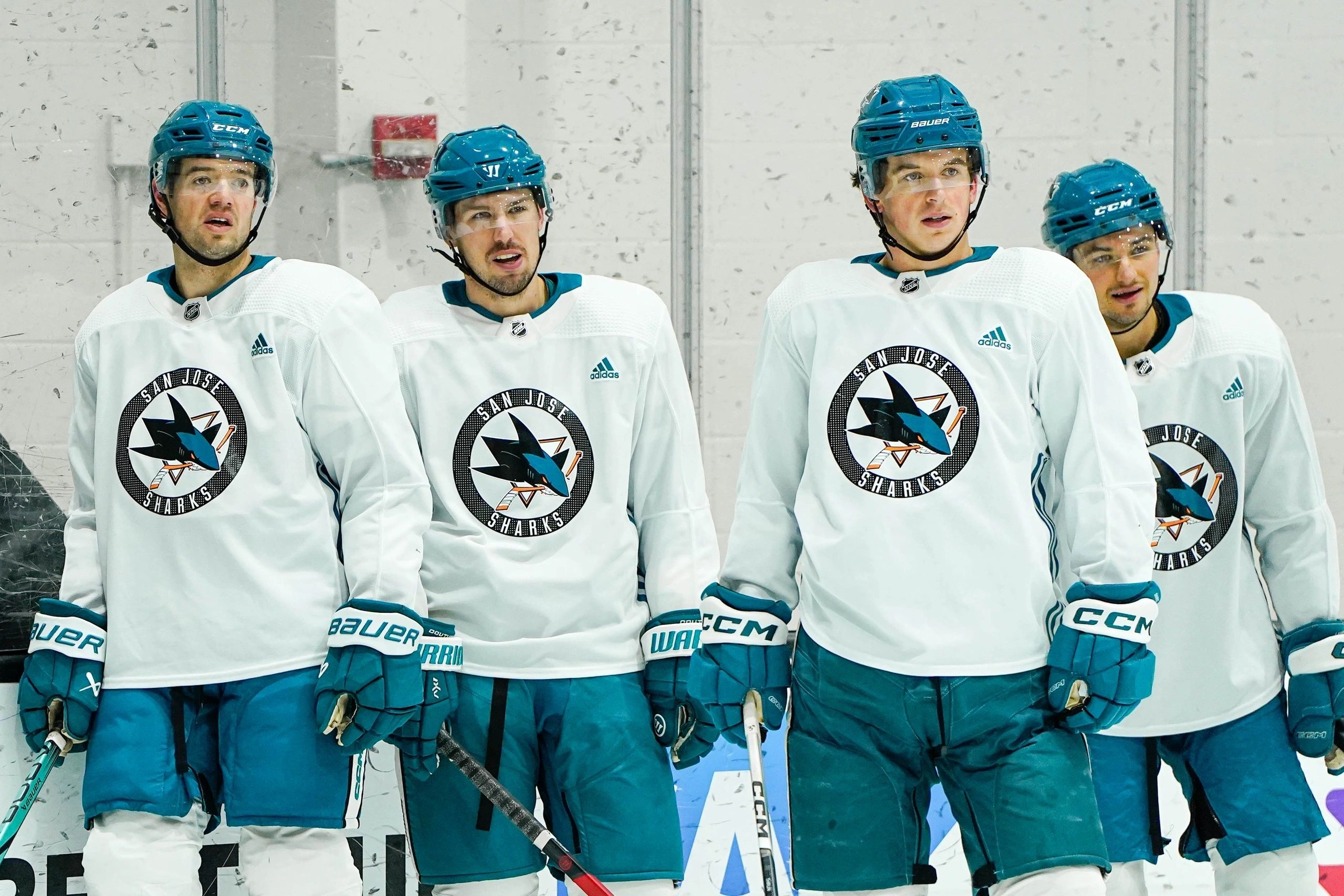 Henry Thrun is the third player from the left during a break in a Sharks practice session (photo courtesy San Jose Sharks)