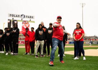Trot Nixon throwing out the first pitch at Tuesday's opening day (photo via Ashley Green/WooSox)