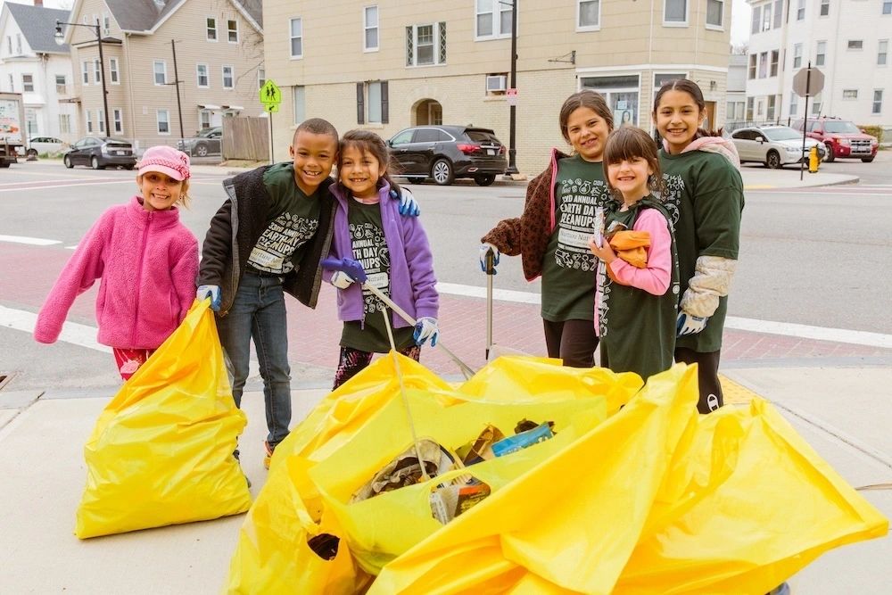 Participants in past REC Earth Day clean-ups (photo by George Annan Jr.)