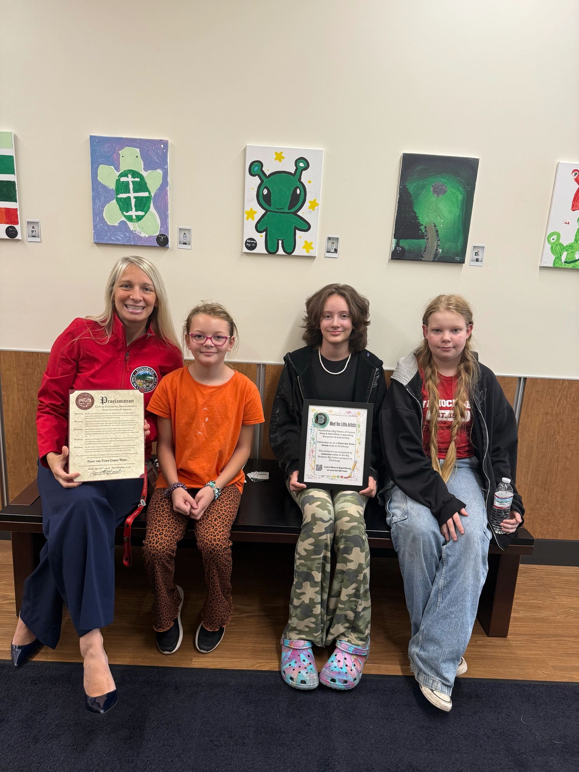 Mayor Sam Squailia with three of the artists: Bailey Landry, Adrianna Tardiff, Patricia Landry (photo courtesy Big Brothers Big Sisters)