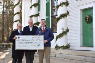 State Rep. Todd Smola (left) and State Sen. Ryan Fattman (right) present a $15
