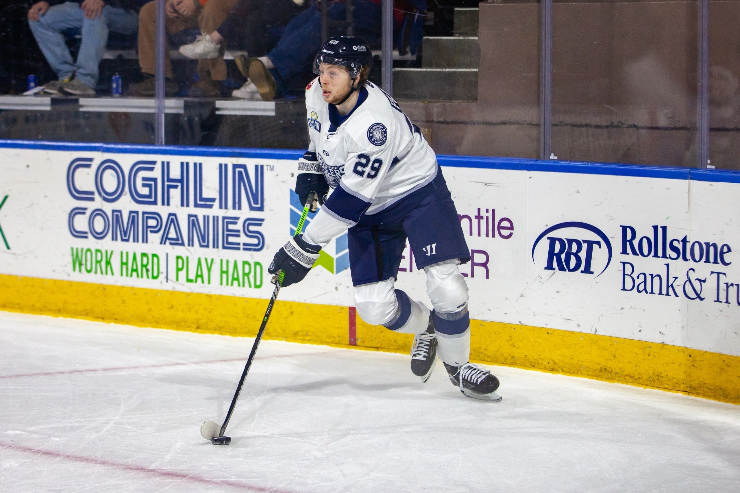 Piercey takes a shot vs. Maine; Number 44 in white behind him is Anthony Callin (photo by Ben Schenck)
