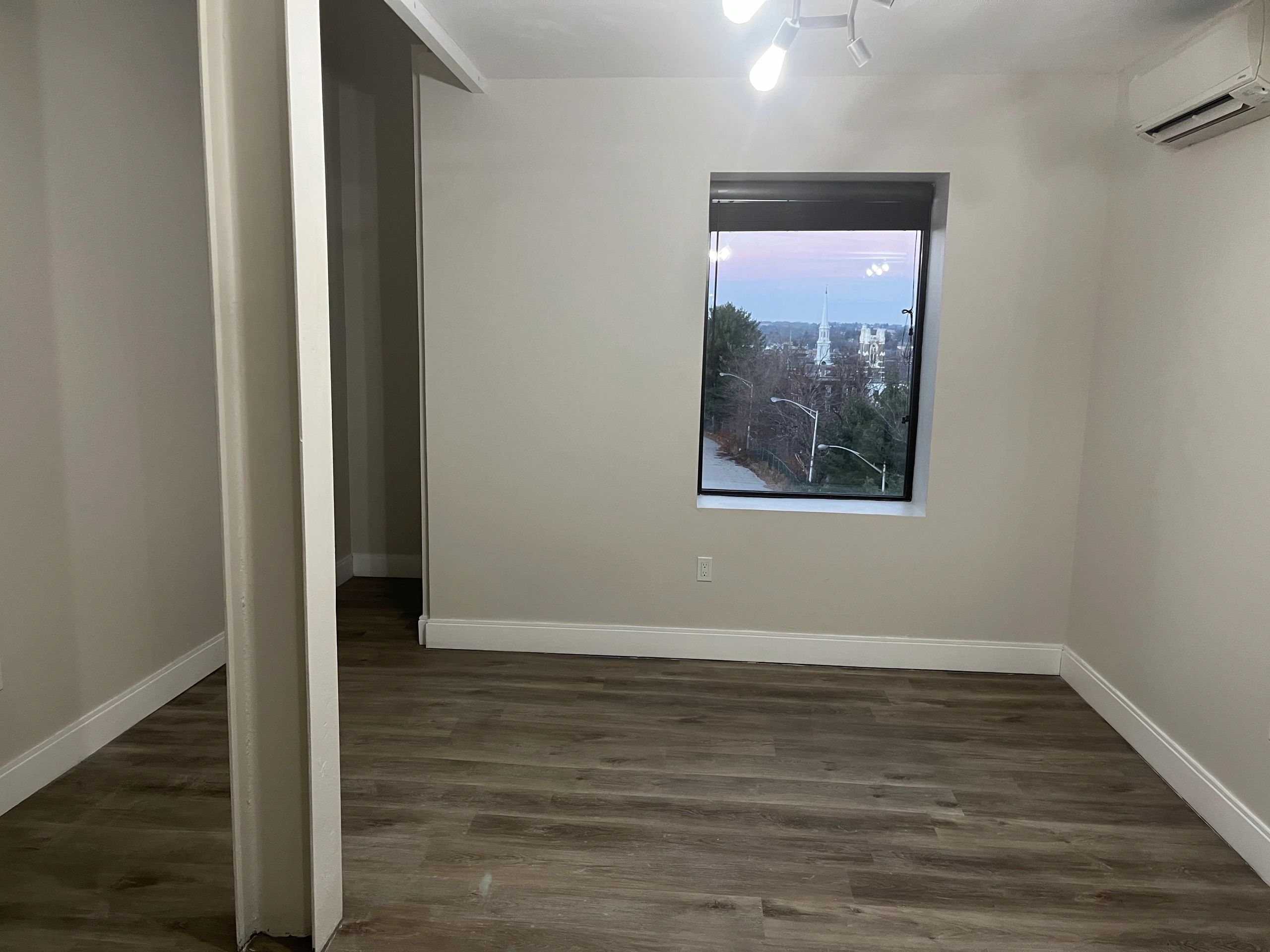 A bedroom in a 13 Sudbury St. apartment unit. 