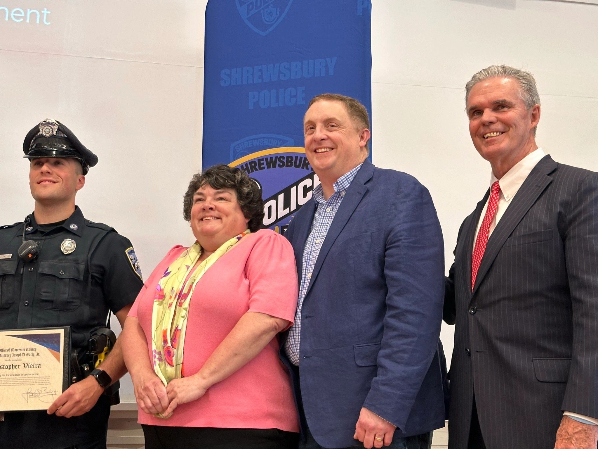 Andy MacIsaac (center, with blue jacket) said that a simple "thank you" doesn't seem like enough (photo by Kim Ring)