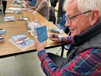 EcoTarium Trustee Bob McLaren painting a tile for the mural (photo submitted)