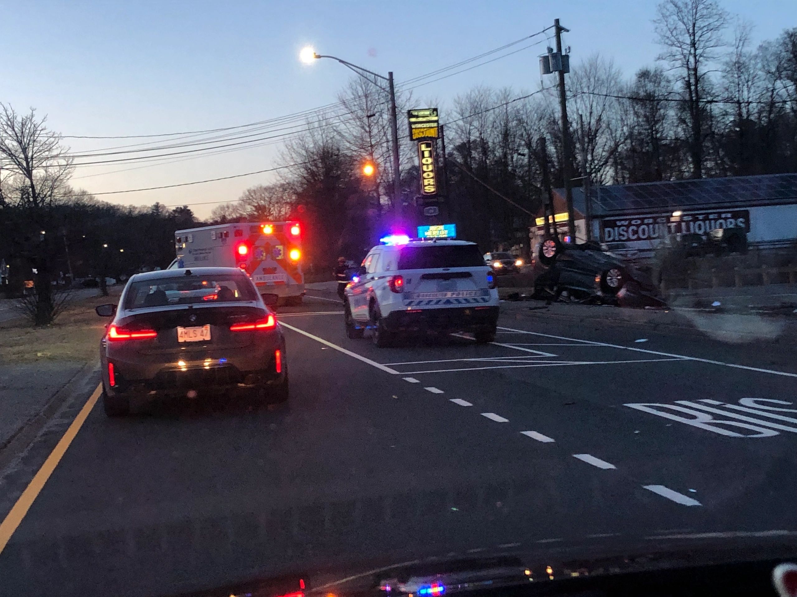 Police and paramedics respond to a rollover on Mill Street on Tuesday night (photo by Charlene Arsenault)