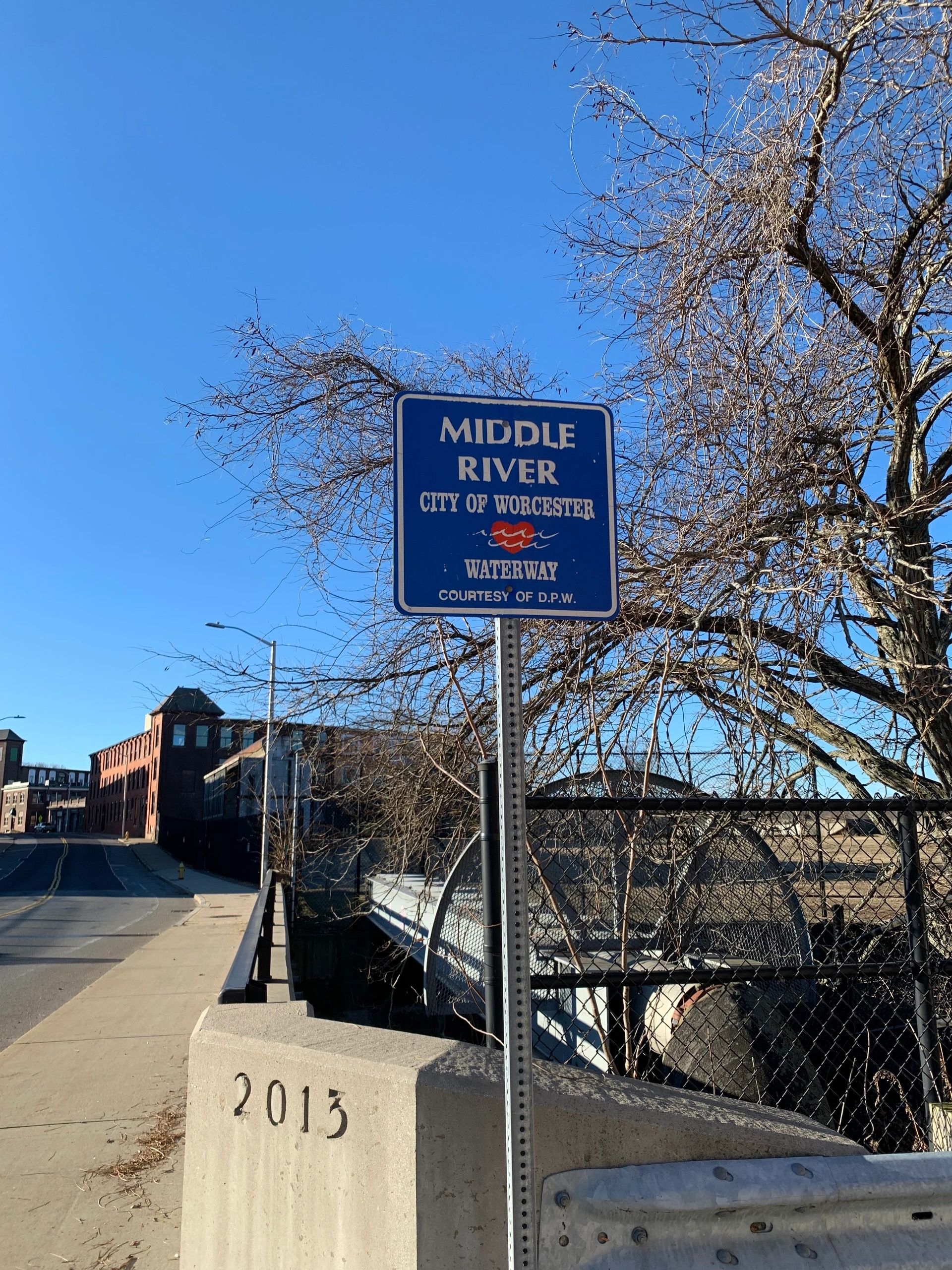The city's official designation of the Middle River, next to the Webster Street fire station (photo submitted)