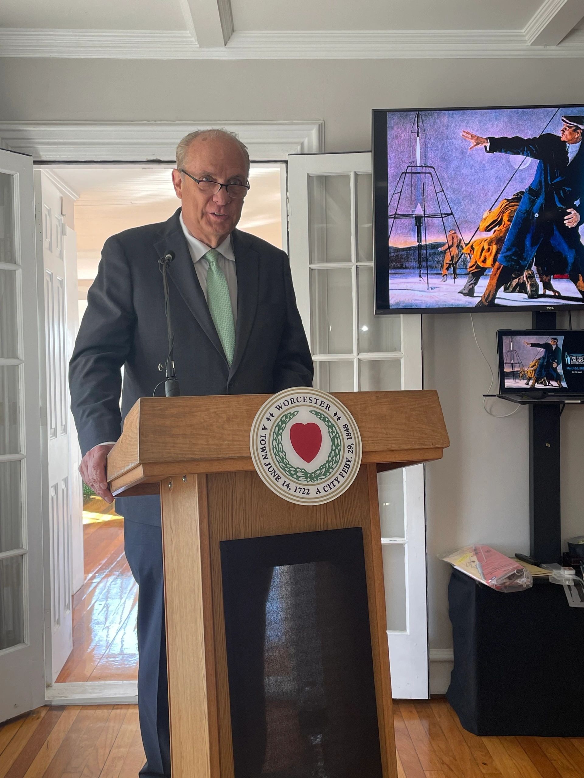 Mayor Joseph Petty speaking at a press conference at the former home of Robert and Esther Goddard on Saturday (photo by Bill Doyle)
