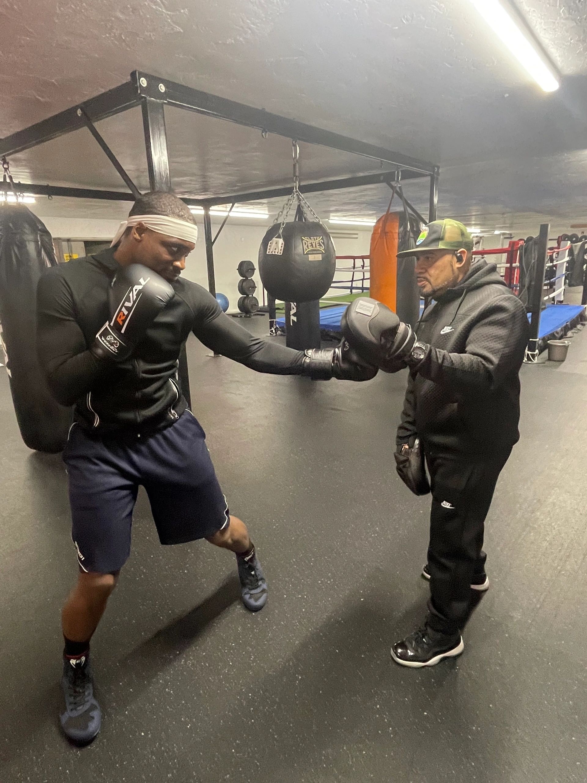 Demek Edmonds training with Rocky Gonzalez (photo by Bill Doyle)