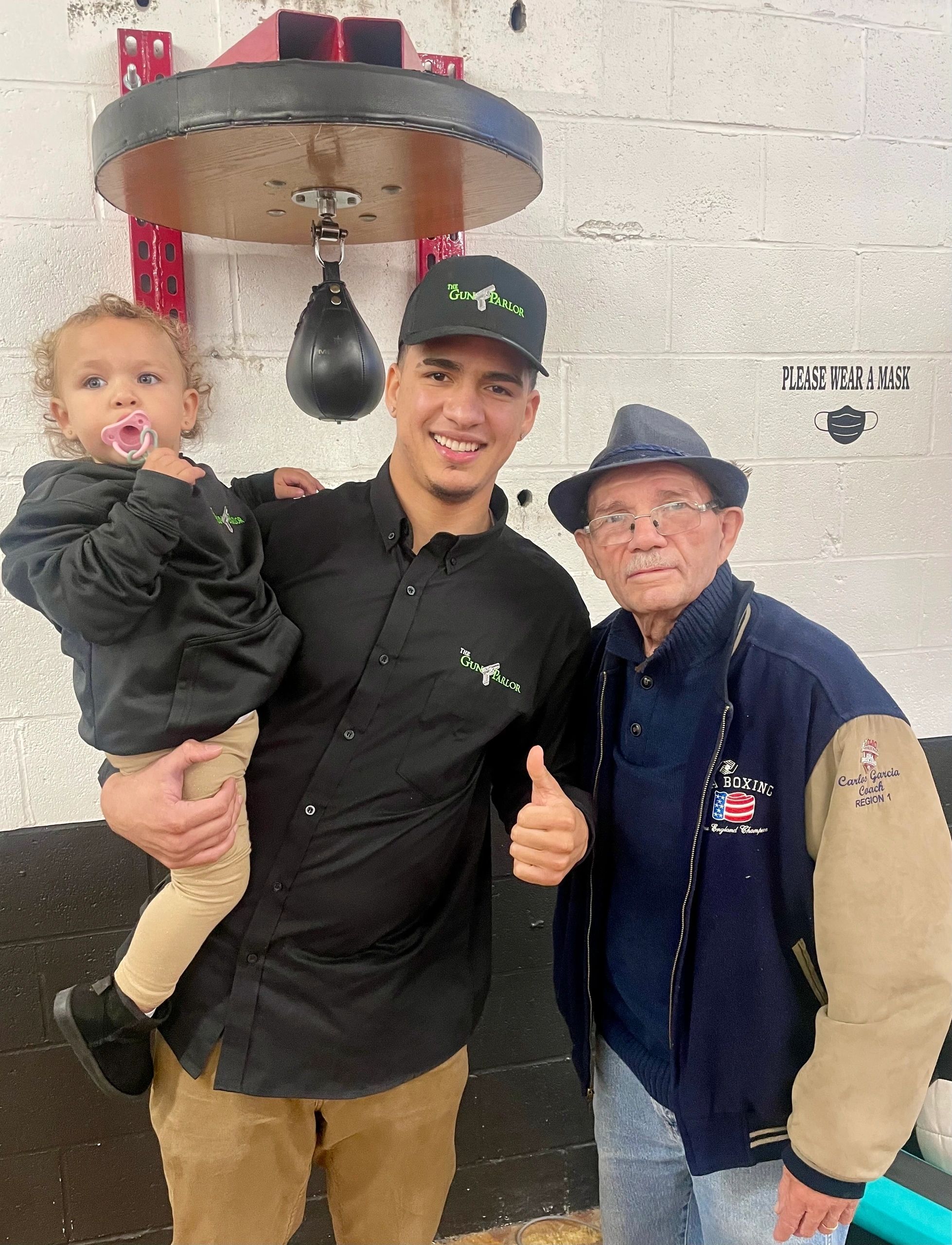 Jhon Danny Devers Rodriguez with his daughter Juliet and coach Carlos Garcia, who celebrated his 75th birthday on Tuesday (photo credit: Bill Doyle)