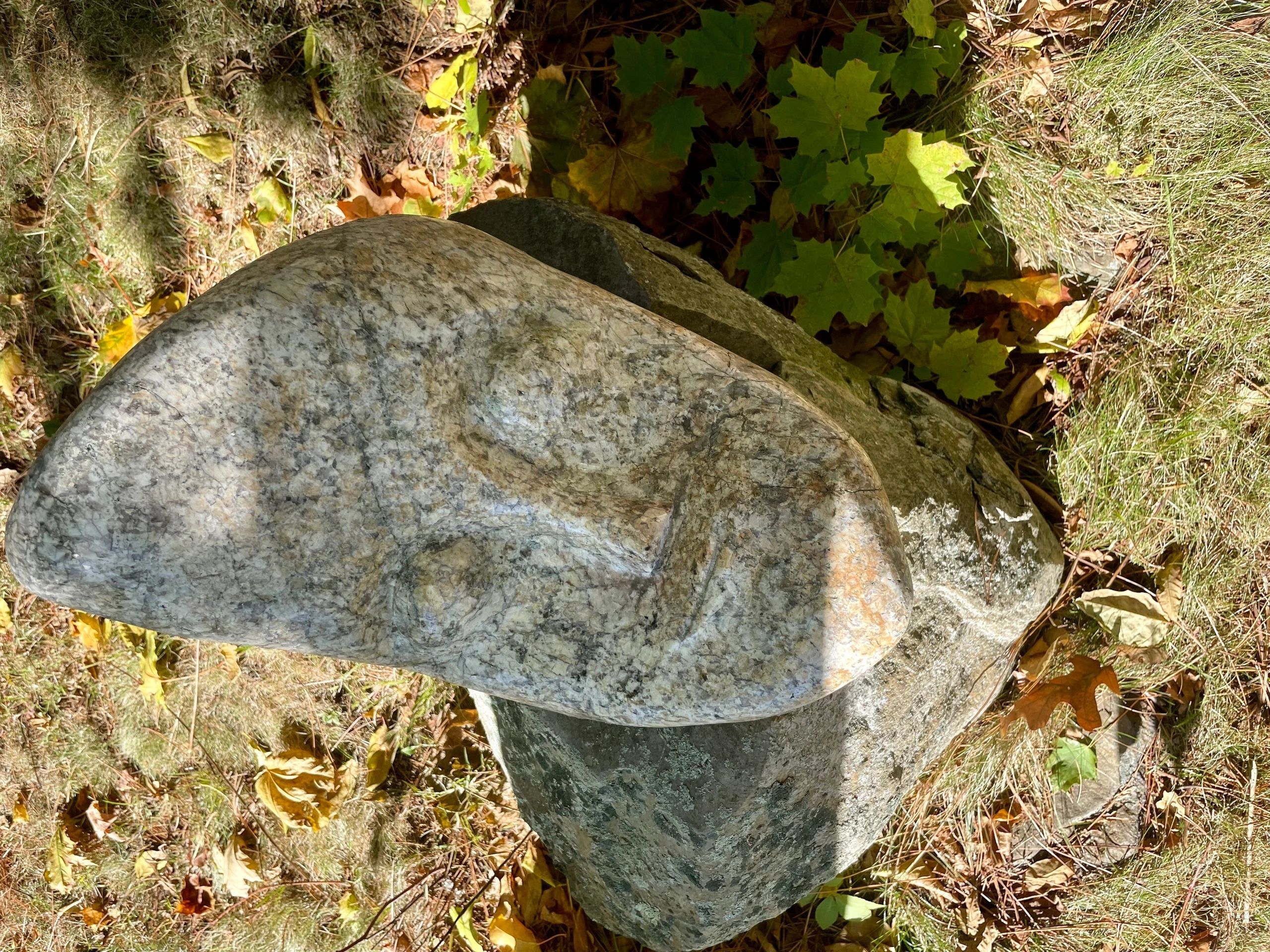 John Buell carved this stone to look like Gumby. He also thinks it looks like Jay Leno (photo by Bill Doyle)