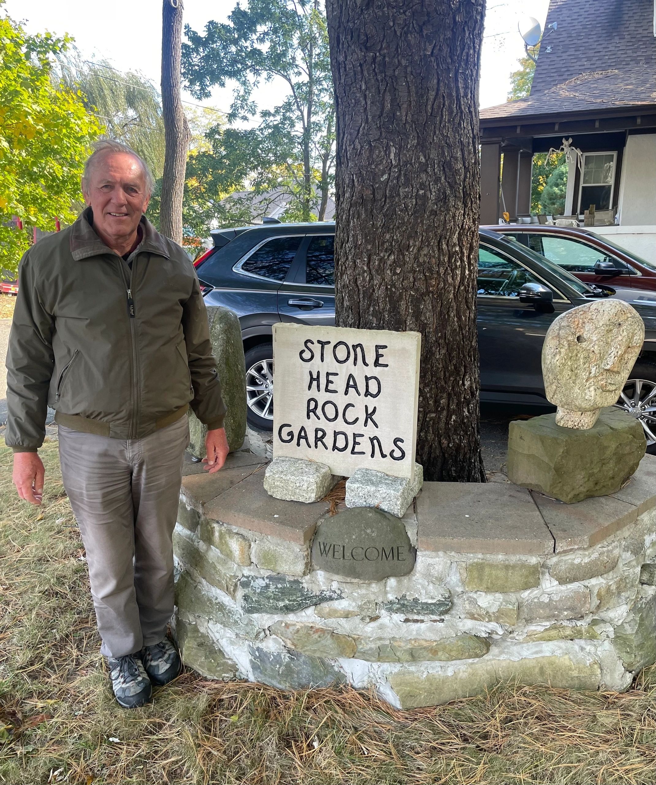 John Buell has carved about 100 stones in his yard (photo by Bill Doyle)