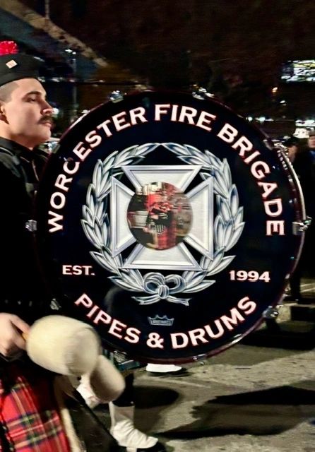 The procession down Franklin Street included the Worcester Fire Brigade Pipes & Drum corps (photo by Bill Doyle)