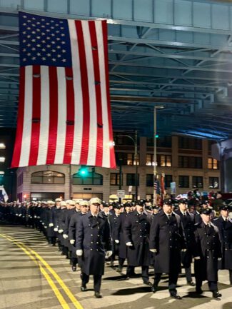 Firefighters process down Franklin Street (photo by Bill Doyle)