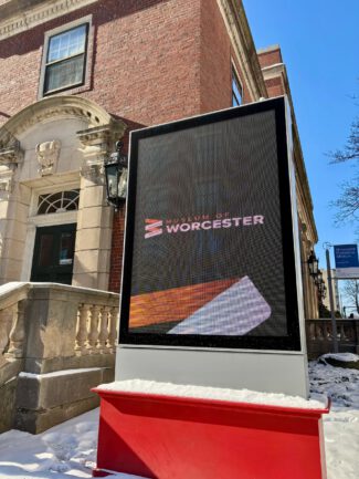 A sign with the new name