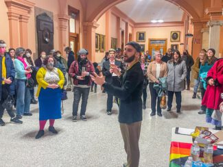 A gathering in the hallway outside of council chambers before the city council meeting on Tuesday evening (photo by Steve Smith)