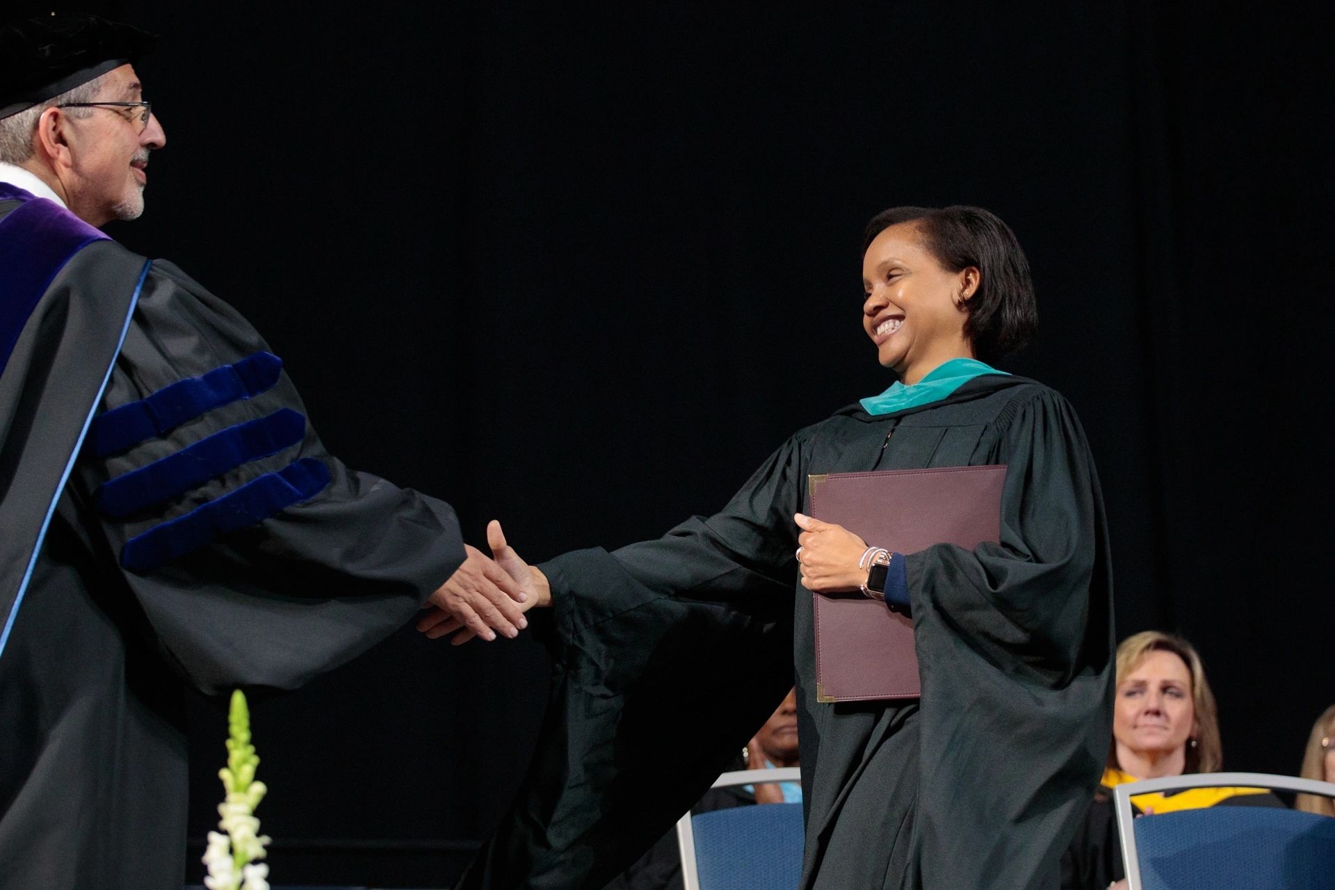 (From left) QCC President Dr. Luis Pedraja and Massachusetts Secretary of Labor and Workforce Development Lauren Jones at QCC’s 60th commencement ceremony (photo by: Quinsigamond Community College