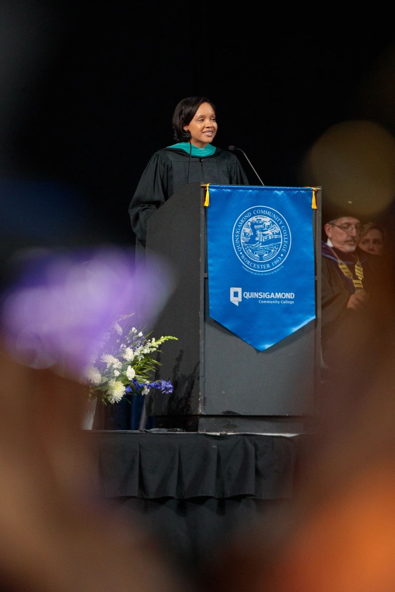 Massachusetts Secretary of Labor and Workforce Development Lauren Jones delivers the keynote address at Quinsigamond Community College’s 60th commencement ceremony (photo by Quinsigamond Community College)