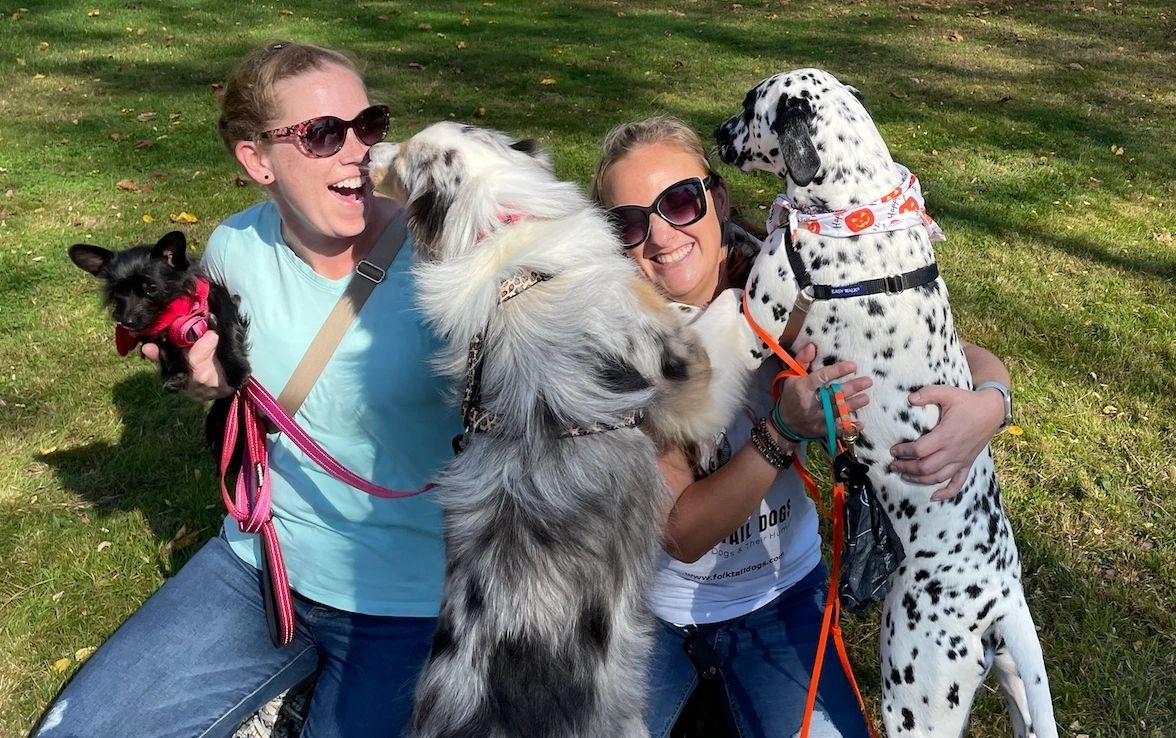 Becky Teman and Lauren Pettit with dogs Birdie, a Dalmatian; Malibu, an Australian Shepard and Charlotte, a rescue dog, mix of chihuahua and Yorkie (photo by Sandy Quadros Bowles)