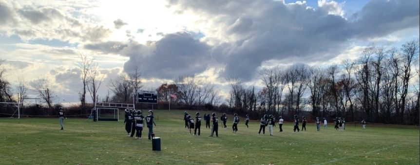 Saint Paul practices for the Thanksgiving game (photo by Bill Ballou)