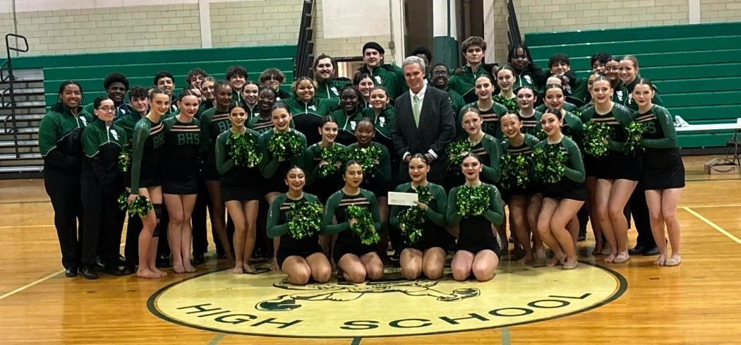 This year's Burncoat High School Spirit team poses with Worcester County DA Joe Early