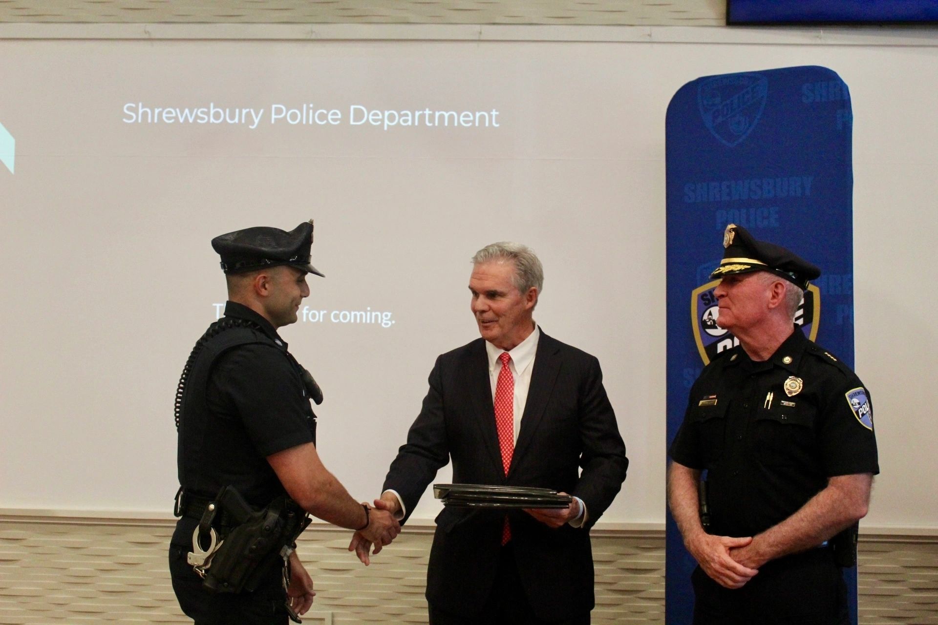 DA Joe Early (center) created the TEAM award in 2019 to recognize public safety employees who go above and beyond the call of duty (photo courtesy)