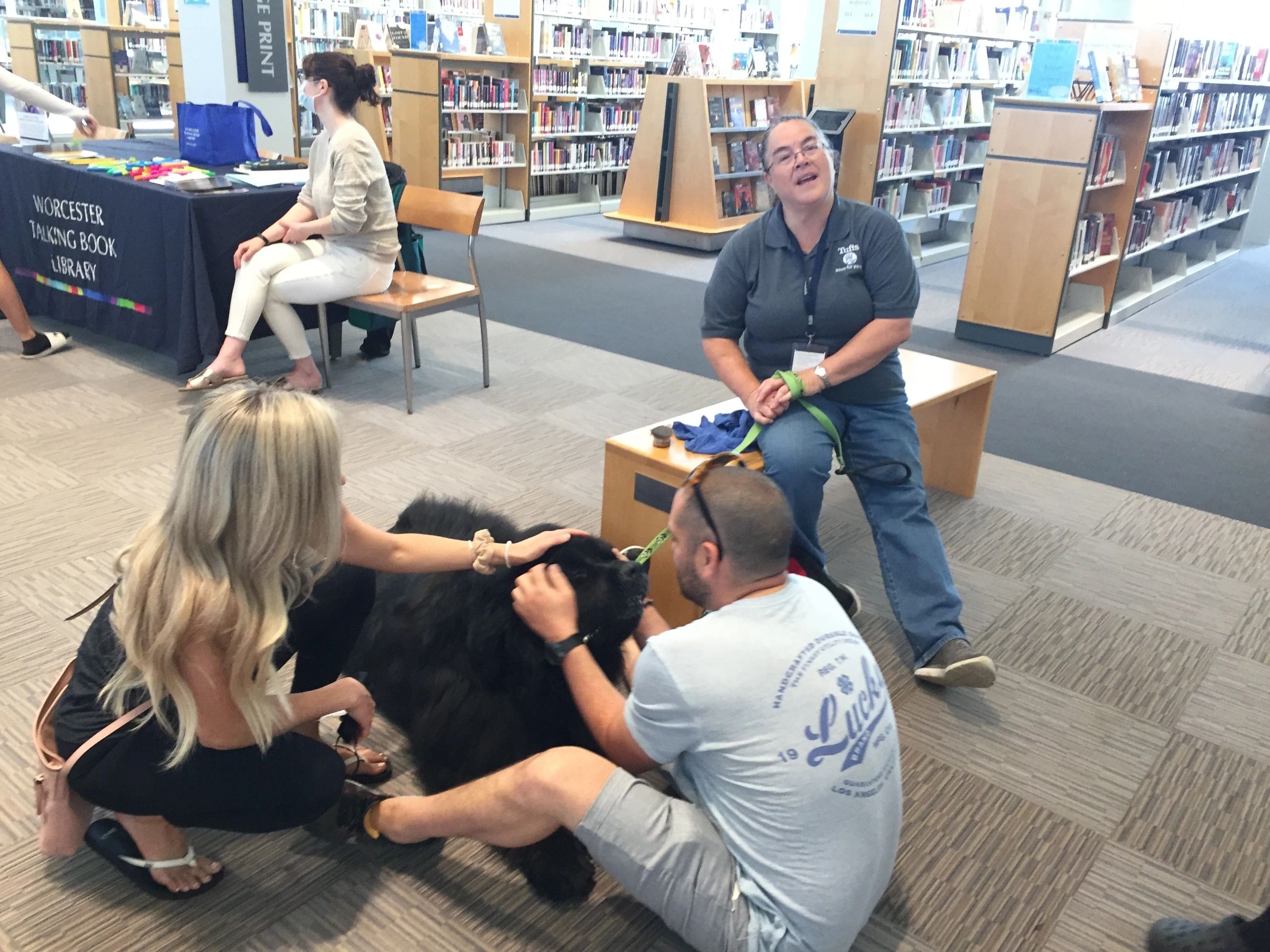 Sheldon the dog makes visitors feel better at a recent WPL hangout (photo submitted)
