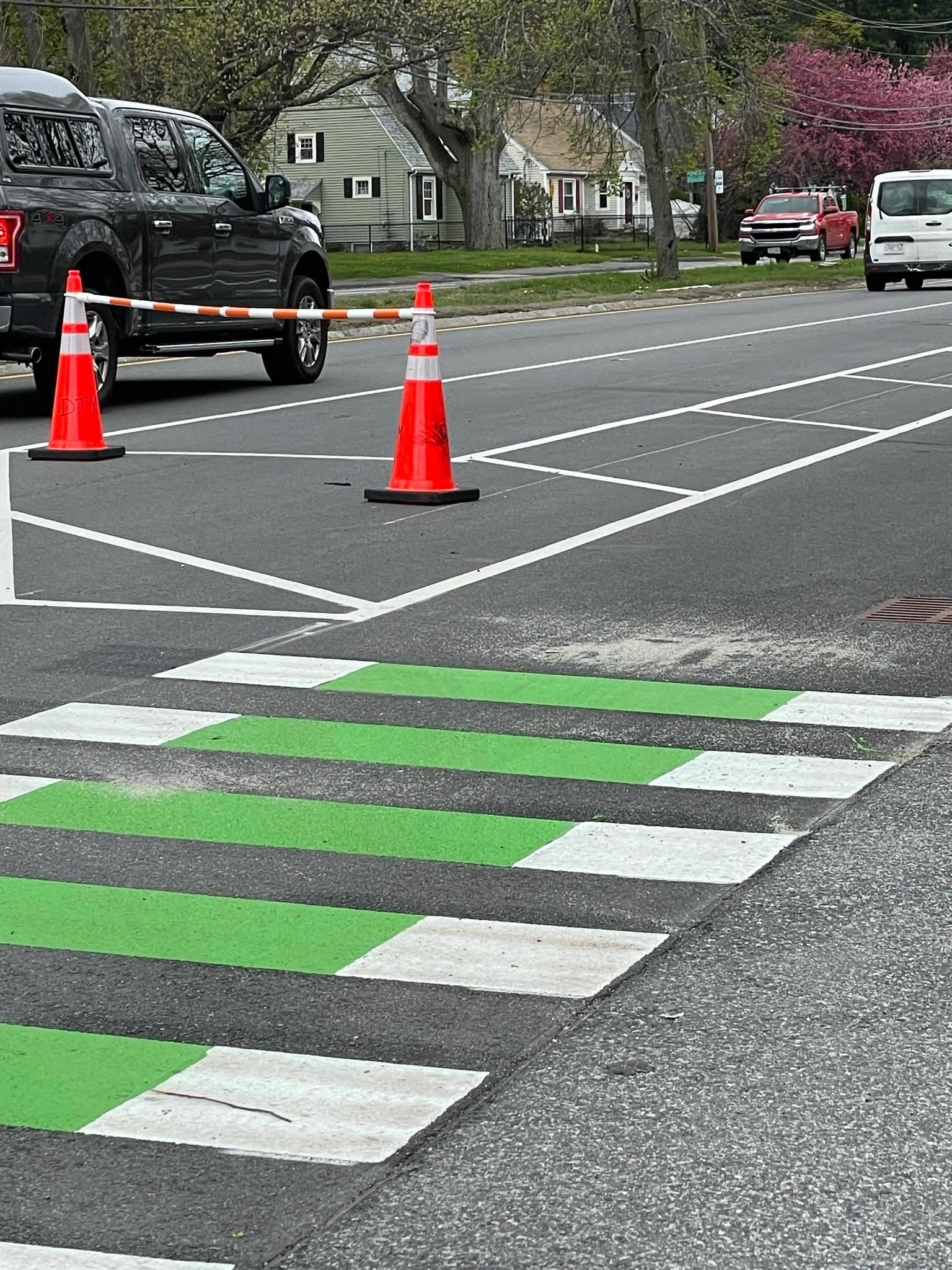 "Limbo bars" have been added to the street to further alert drivers to the traffic and parking pattern. Resident Wayne Griffin said two have been stolen (photo by Wayne Griffin)