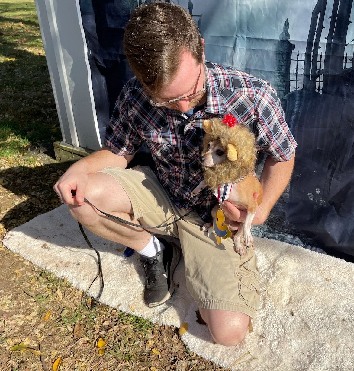 Ben Wendorf with Rudy, aka the Cowardly Lion, saved from a hoarding situation (photo by Sandy Quadros Bowles)