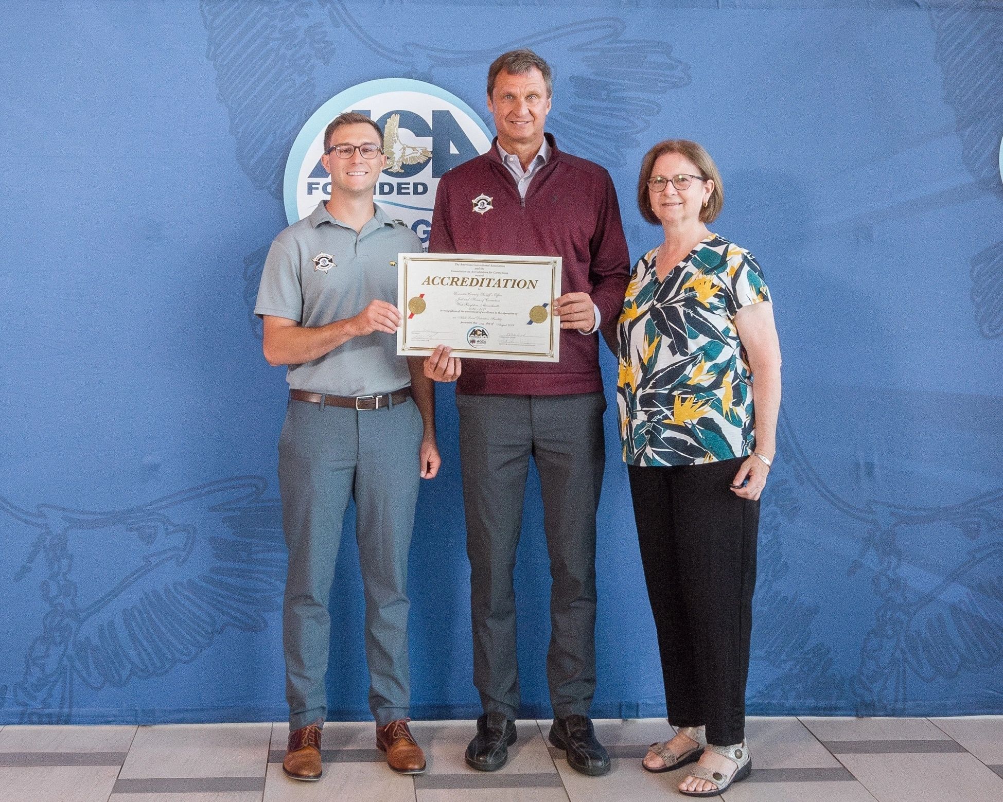 Worcester County Sheriff’s Office Staff receive their official American Correctional Association accreditation certificate after a successful review before a panel of ACA auditors. Left to right: Eric Eisner, director of communications, Sheriff Lewis Evangelidis, Diane Cook, compliance specialist - policy, procedure & accreditation (photo submitted)