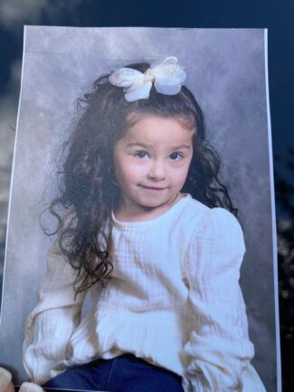 The missing girl named Eva was found unresponsive in a neighbor's pool (photo via Sutton Police Department)